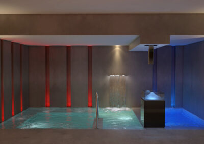 Ice shower in a jacuzzi enclosure